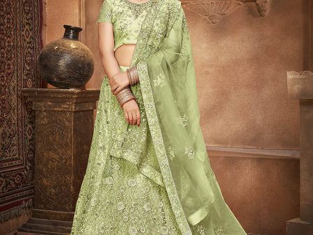 Myra Pista Green Heavy Embroidered Net Lehenga For Sale