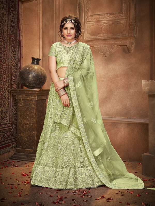 Myra Pista Green Heavy Embroidered Net Lehenga For Sale