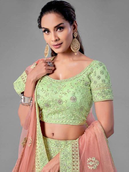 Myra Pista Heavy Embroidered Soft Net bridal Lehenga on Sale